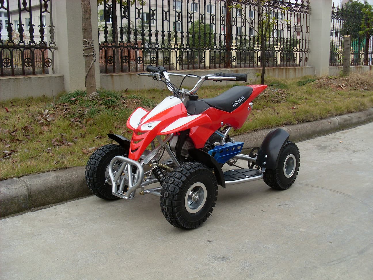 Jinling 49cc 2-Tiempo Mini ATV Quad para niños a gasolina con arrancador de tracción